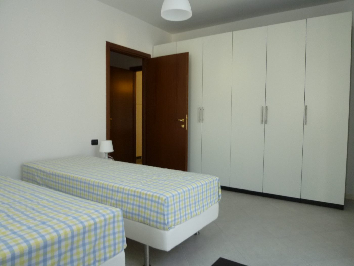Camera da letto del bilocale in affitto a Castellanza